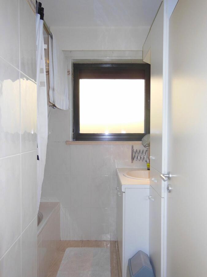 Gezellig gelijkvloersappartement met zonnige tuin en garage 