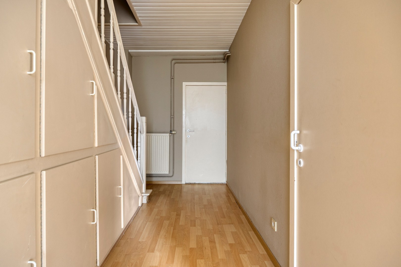 Building met handelspand en duplexappartement met 3 slpk. nabij het centrum van Leopoldsburg 