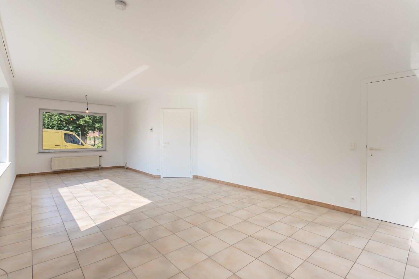 Verzorgde woning met 3 slpk, tuin en garage te Halle 