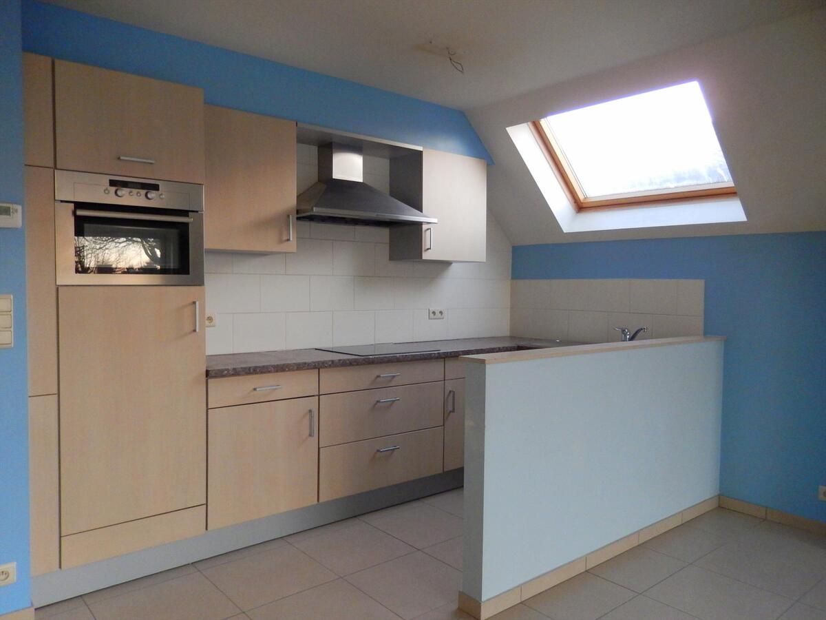 Gezellig en lichtrijk 2 slaapkamerappartement met garage 