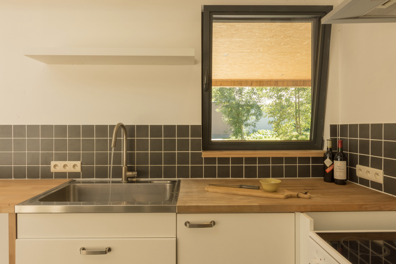 IN OPTIE Ruime en totaal vernieuwde woning in het dorp van Zaffelare 