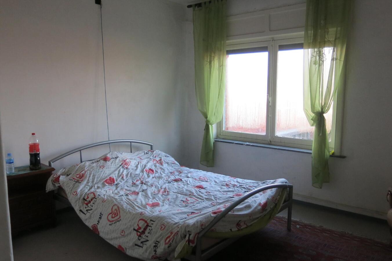 Degelijke ruime woning met garage en tuin op 390m² 