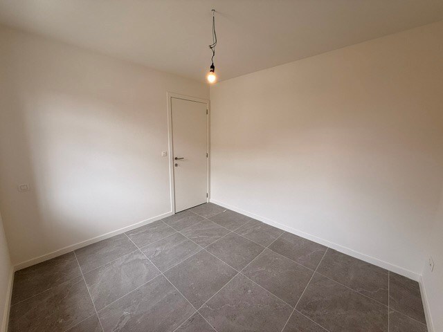 Halfopen nieuwbouwwoning met 4 slaapkamers gelegen te Opitter. 