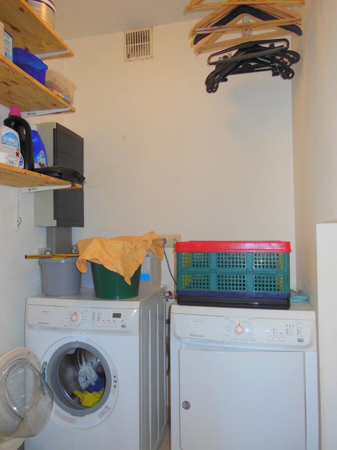 Gezellig gelijkvloersappartement met zonnige tuin en garage 