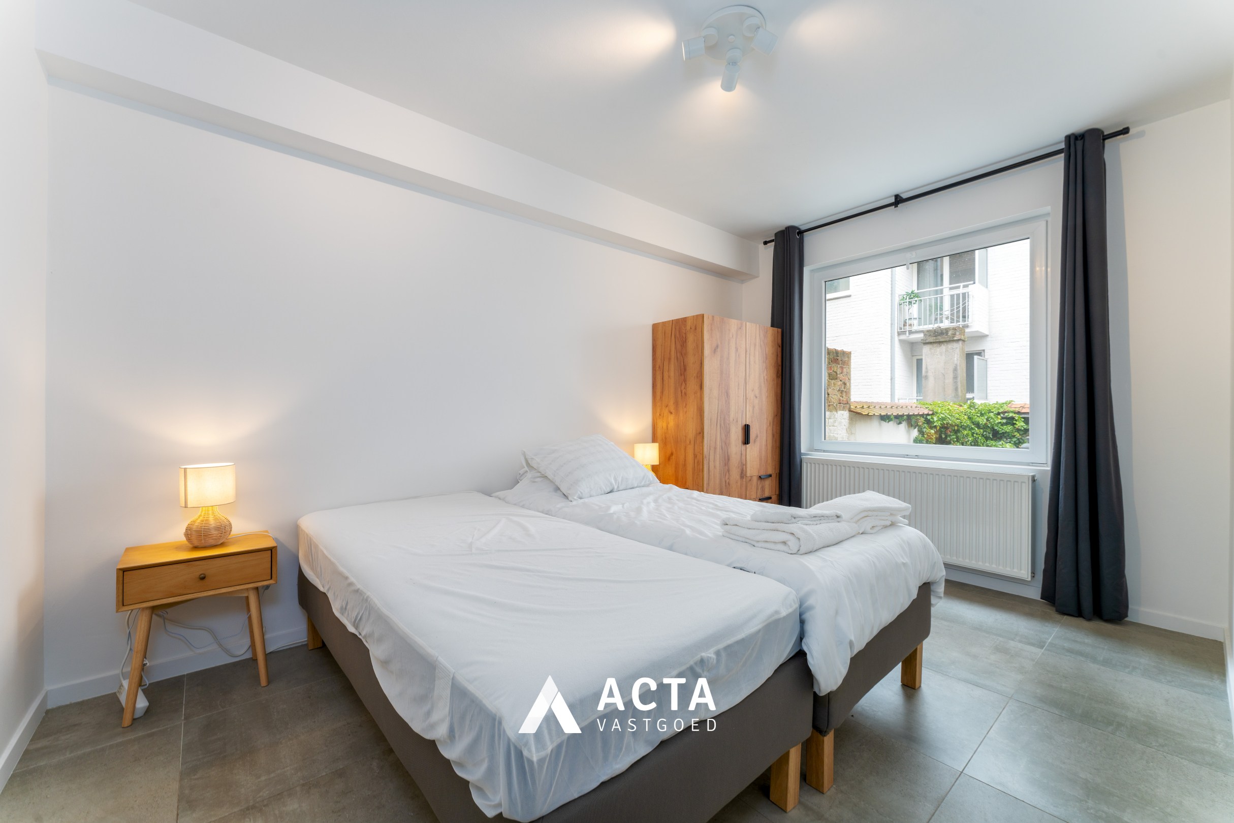 Gerenoveerd appartement met 2 terras in centrum 