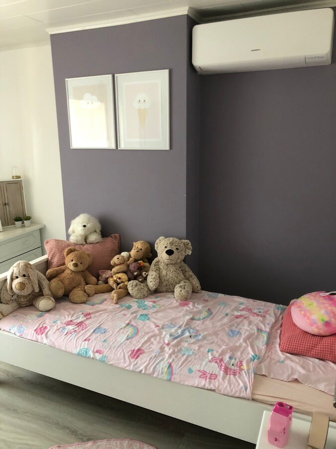 Alleenstaande woning met 5 slaapkamers en diepe tuin te Zarren 