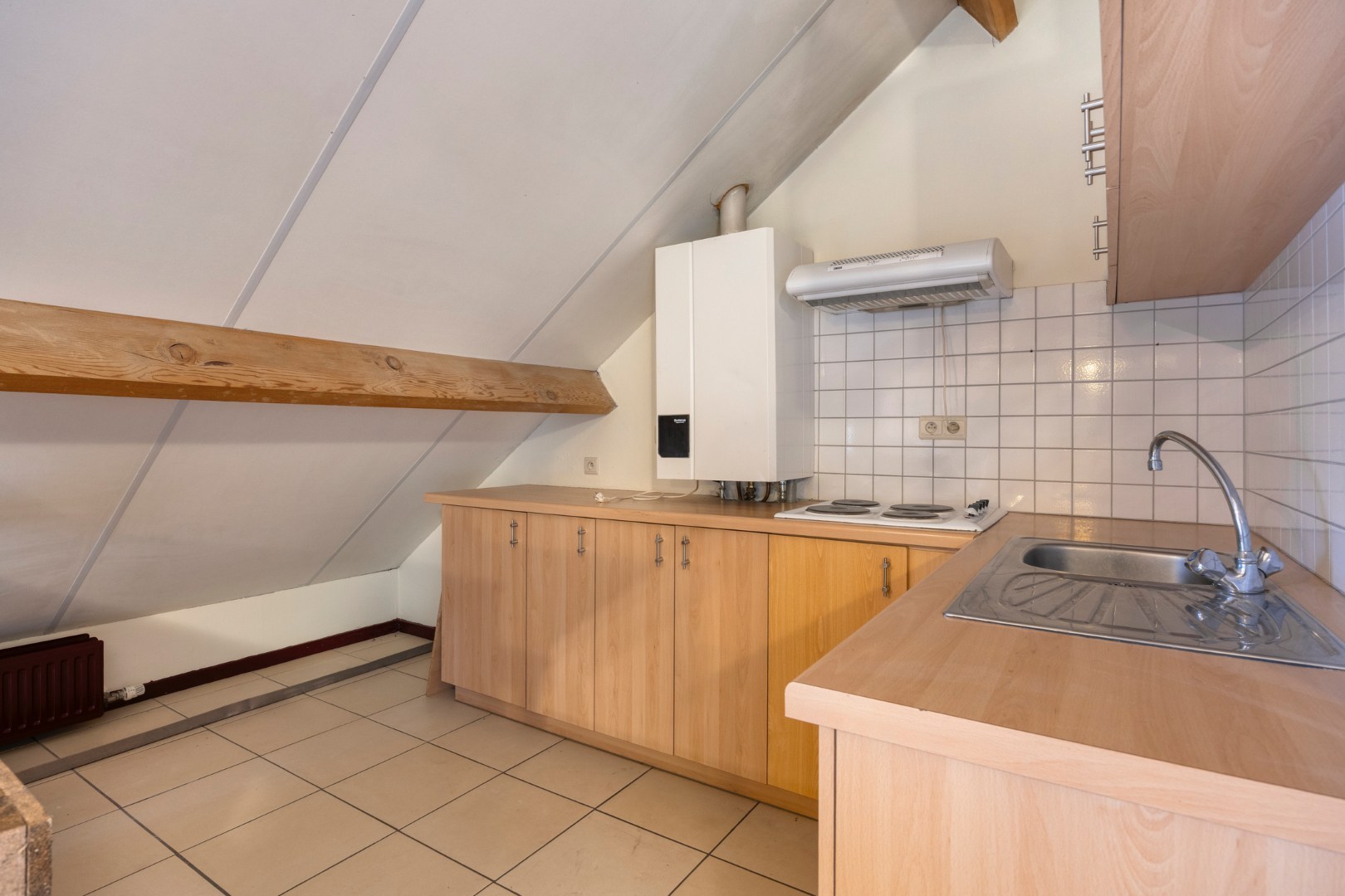 Instapklaar dakappartement met 1 slpk. in centrum Olmen! 