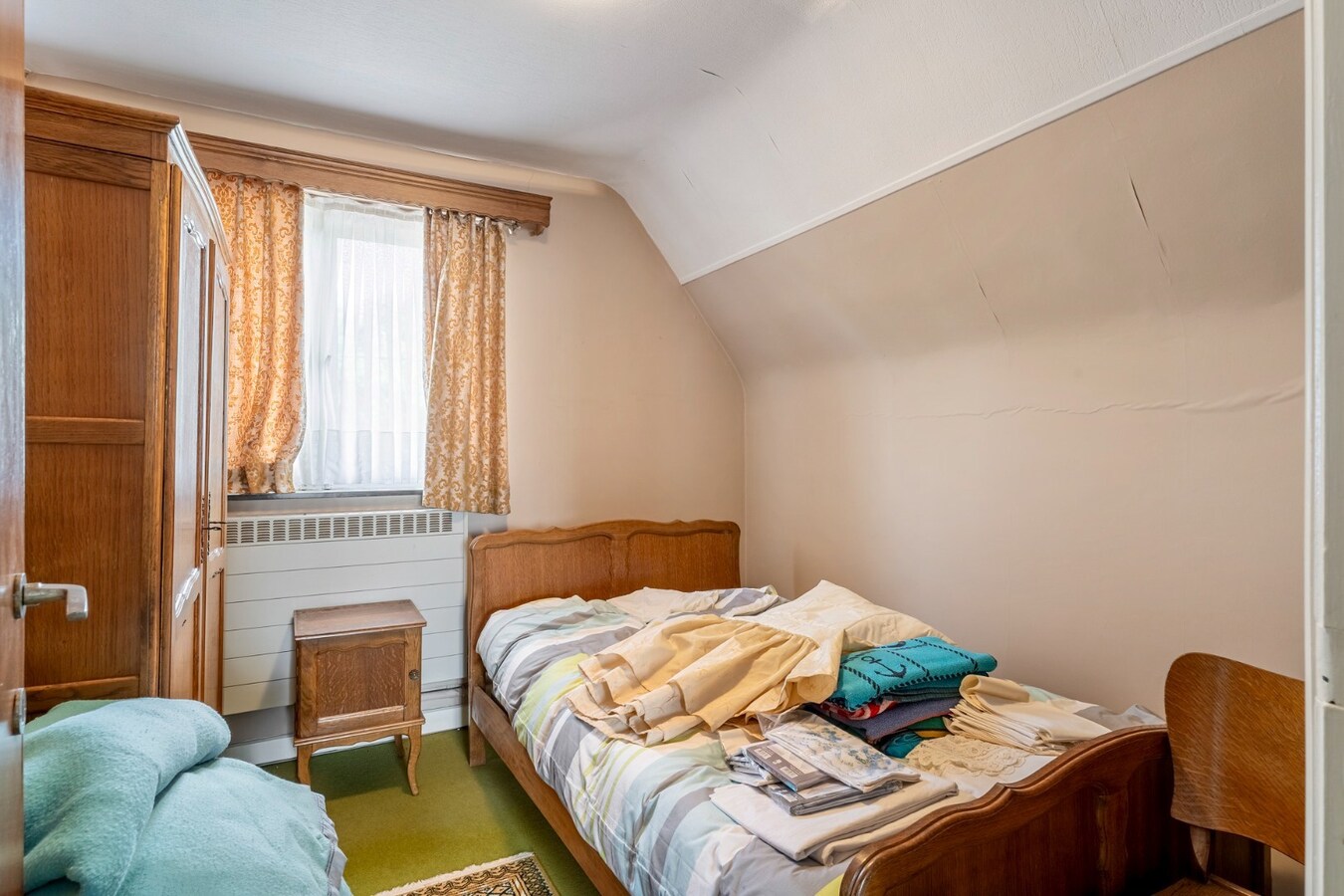 Halfvrijstaande gezinswoning op een ruim perceel van 13a80ca op wandelafstand van het centrum van Opoeteren! 