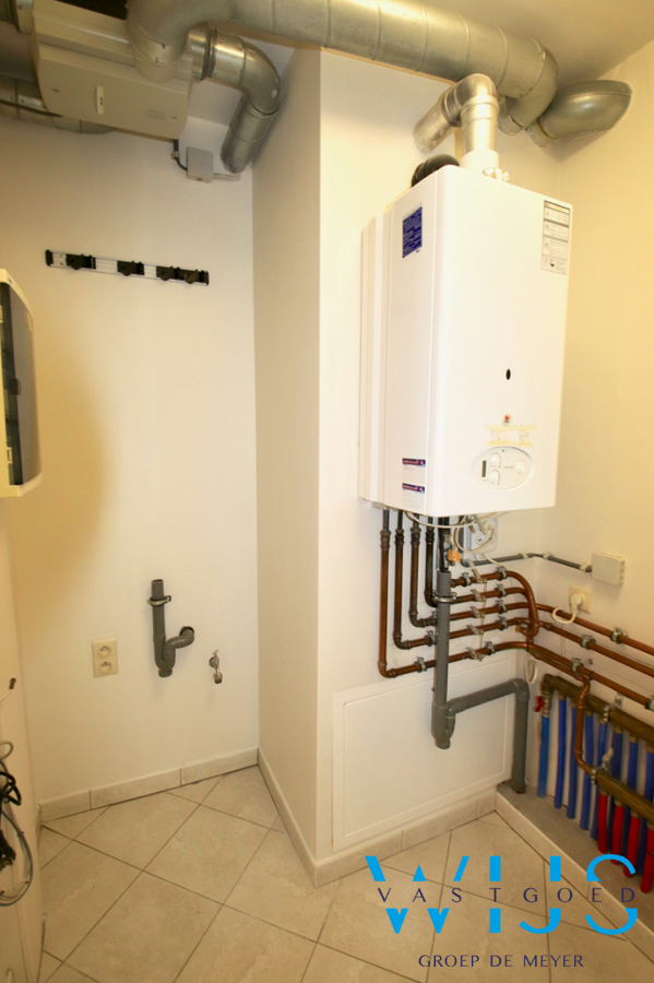 Instapklaar 3 slaapkamerappartement met garage in hartje Assenede ! 