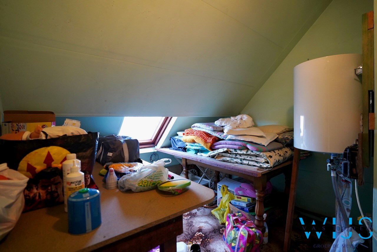 Interessante te renoveren woning met 4 slaapkamers in het centrum van Destelbergen 