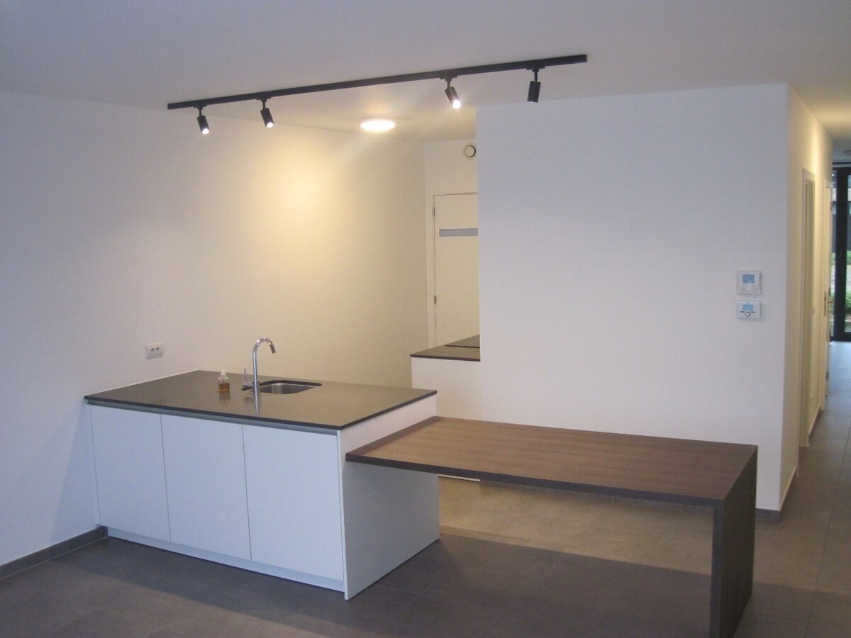 Gelijkvloers 2-slaapkamer appartement met uitzonderlijk terras. 