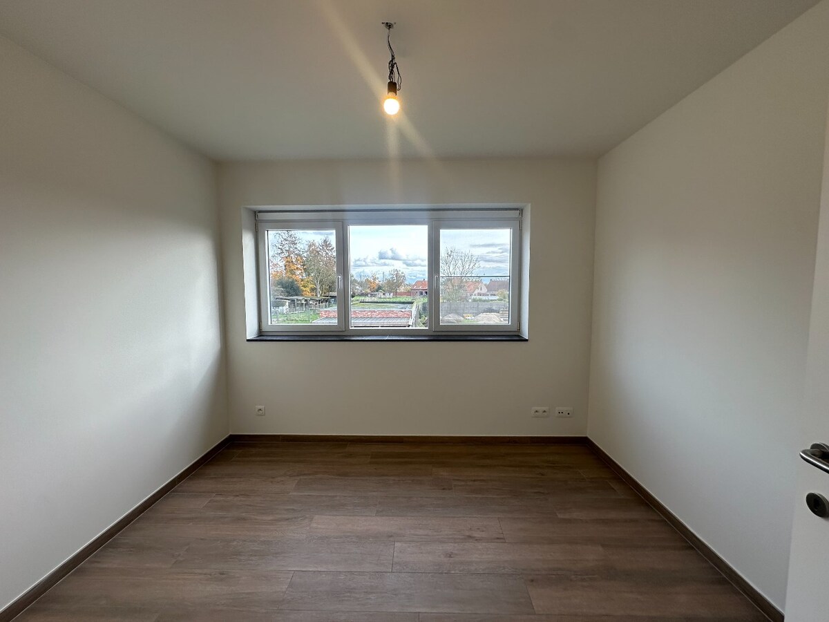 Ruim duplex-appartement met 3 slaapkamers en tuin te Werken 
