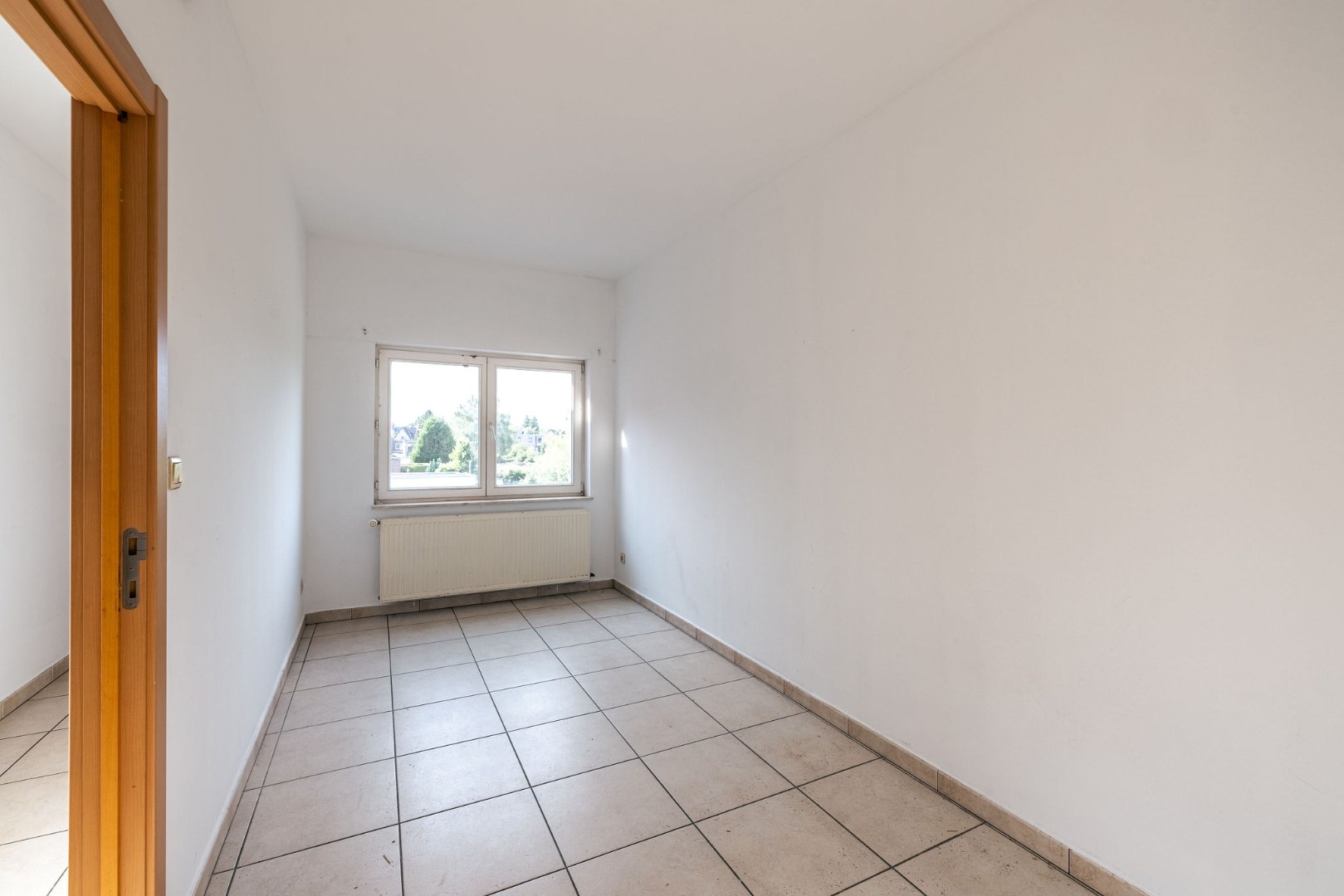 Lichtrijk en instapklaar wonen op de eerste verdieping nabij Gent 