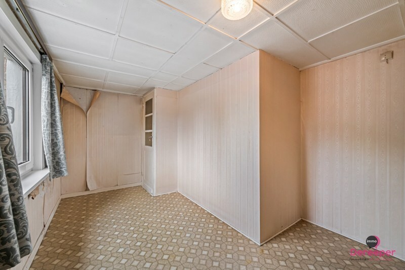 Te renoveren rijwoning op centrale ligging met leuke zuidgerichte tuin 