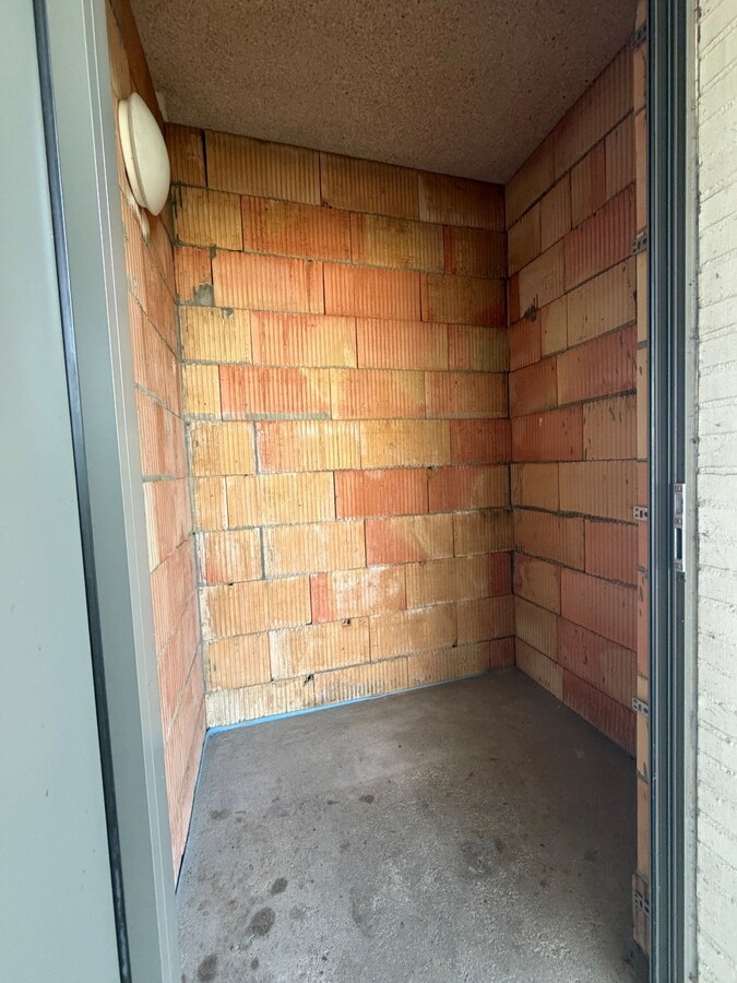 2 slpk-appartement nabij allerhande voorzieningen. 