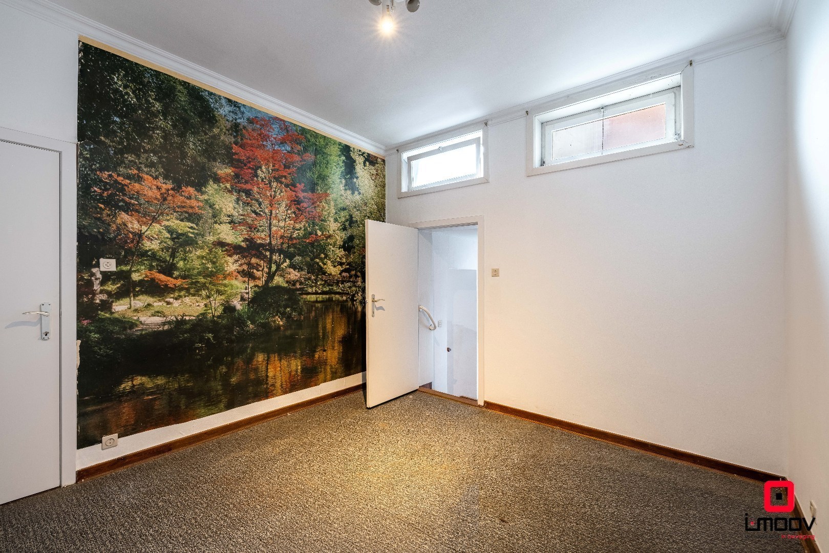 Ruime te renoveren stadswoning met garage en vier slaapkamers in de stationswijk 