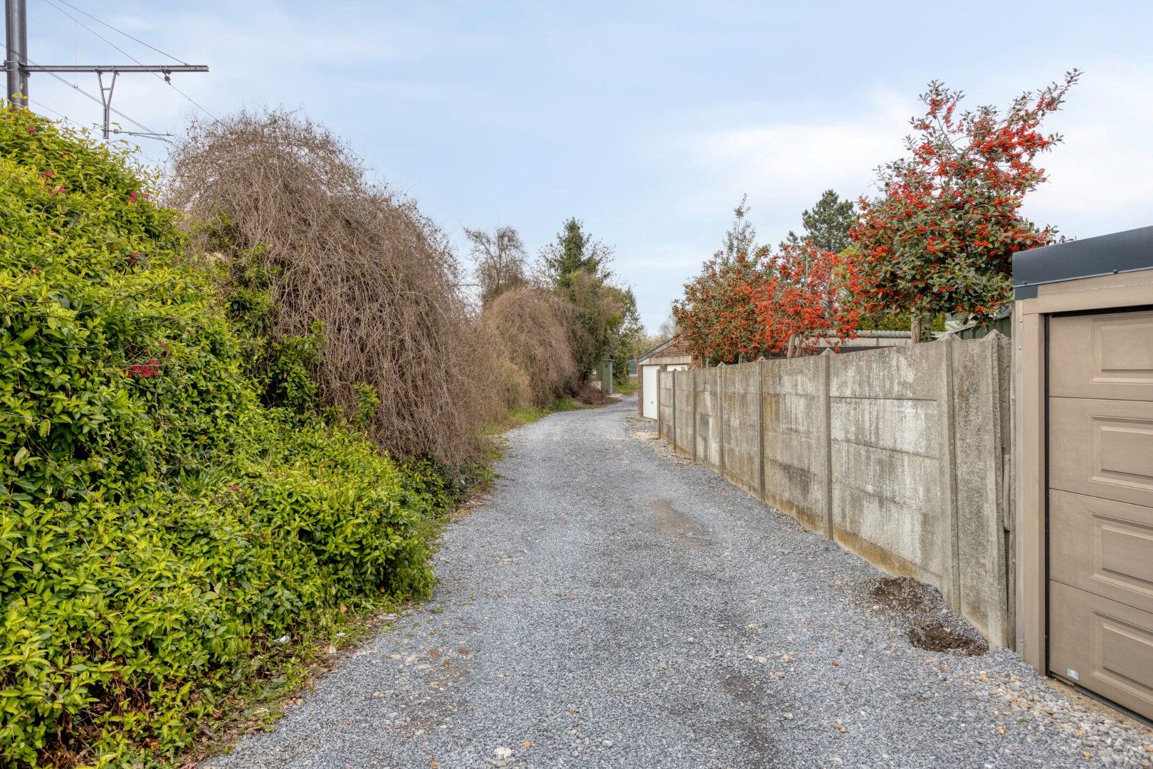 Elderseweg - doorgang garage en tuin
