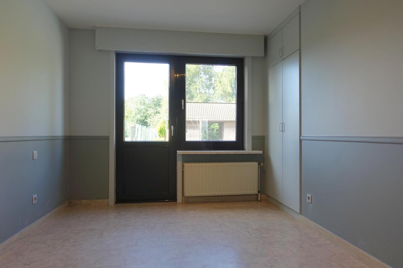 Gezellige half-open woning met zonnige tuin 