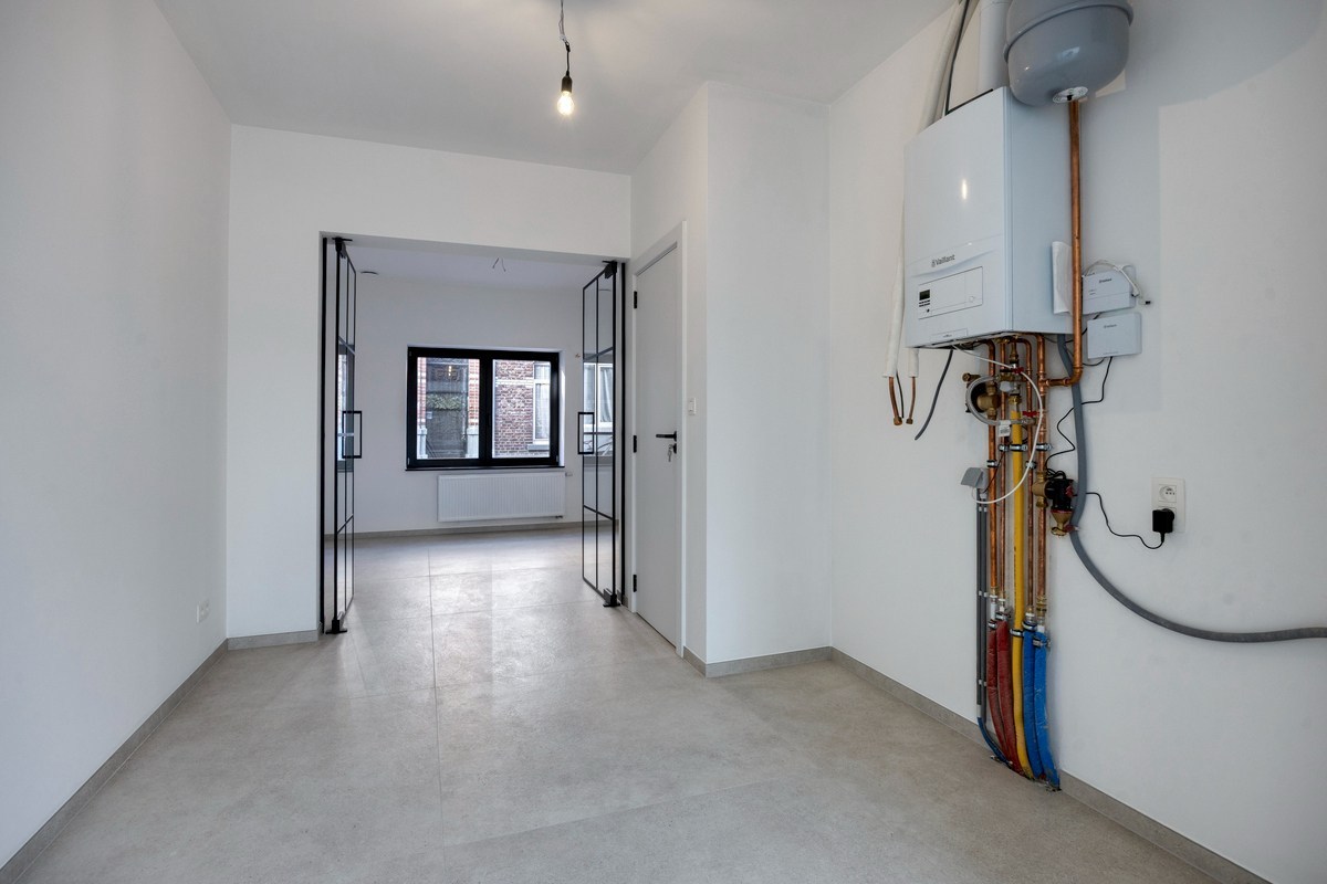 Volledig gerenoveerde woning met 3 slaapkamers, badkamers en tuin in Tienen! – EPC A - bewoonbare opp. 130 m² 