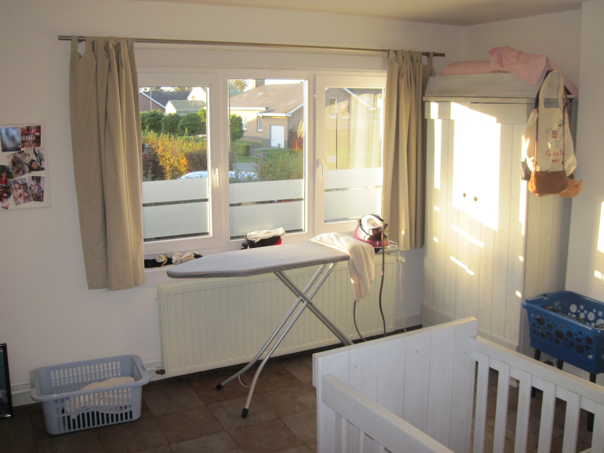 Degelijke én gezellige woning. Met tuin en met garage. 