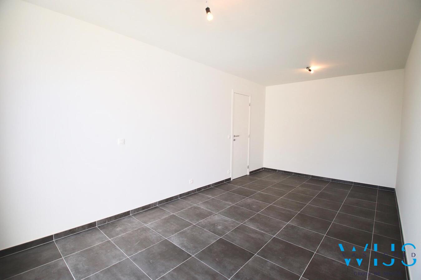 Gelijkvloers appartement met TUIN &amp; GARAGE te Zelzate! 