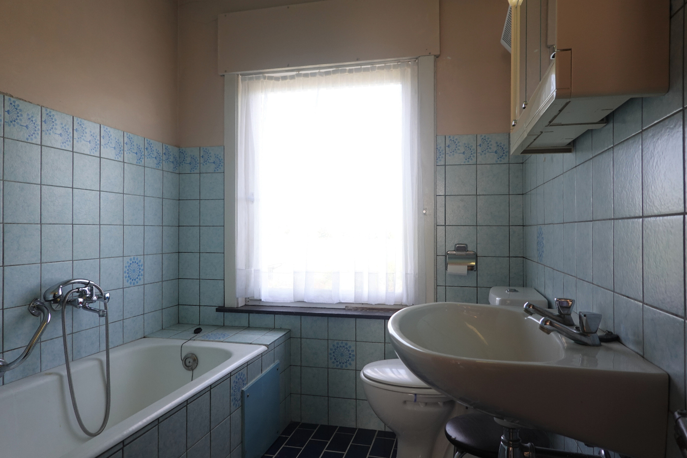 Alleenstaande woning met garage en mooie tuin 