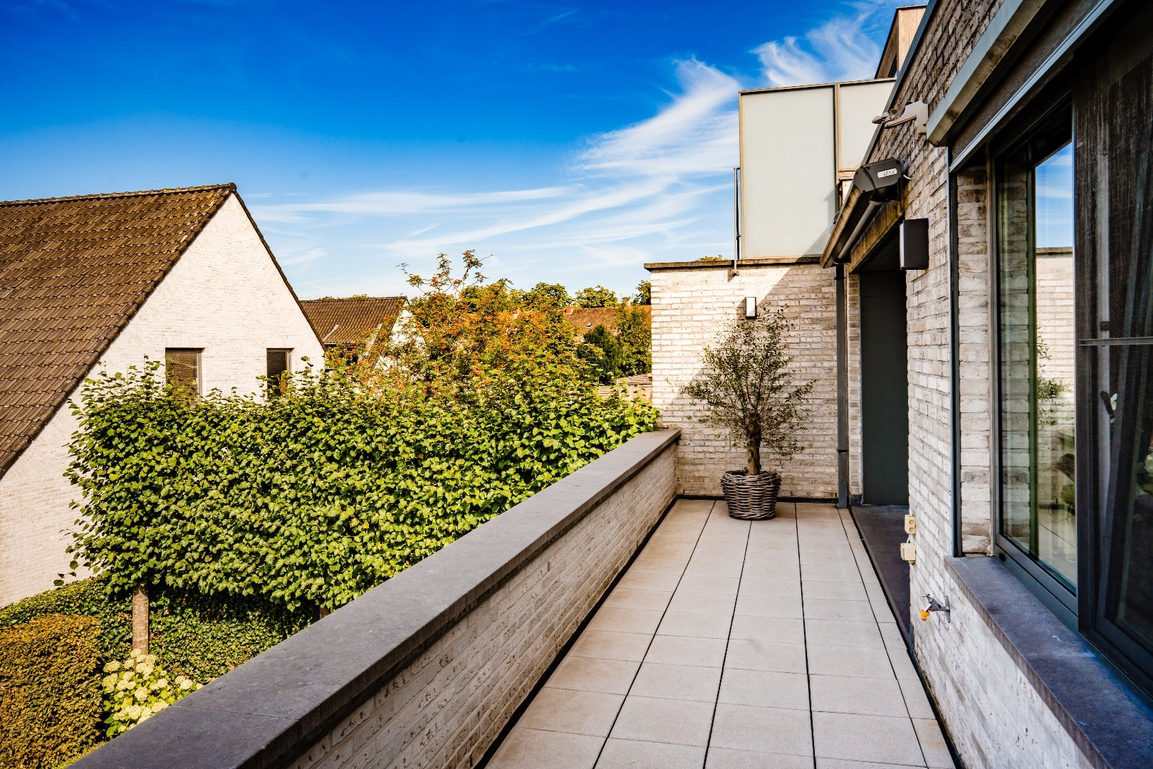 Ruim duplex appartement (203m²) met 4 slpks en garage te Kaprijke 