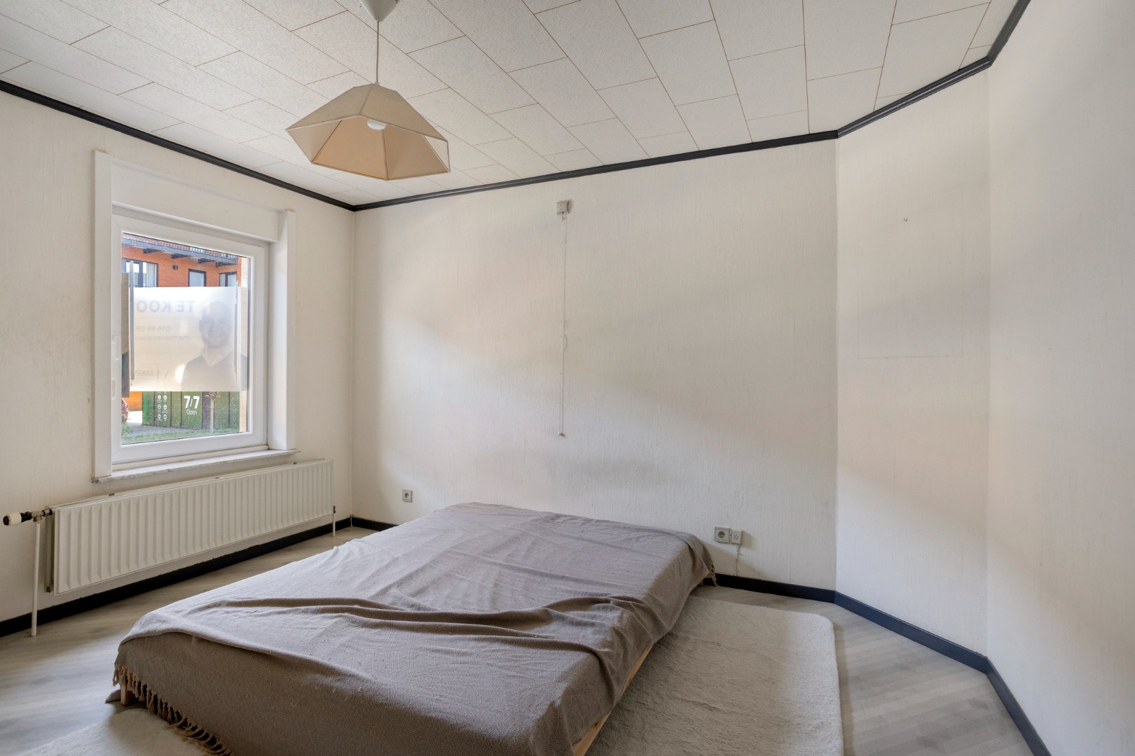 Centraal gelegen rijwoning in Kessel-Lo met parking - EPC 246 kwh/m² 