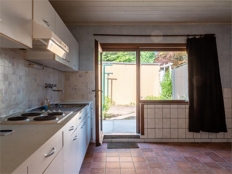 Charmante halfopen woning te Watervliet met potentieel. 