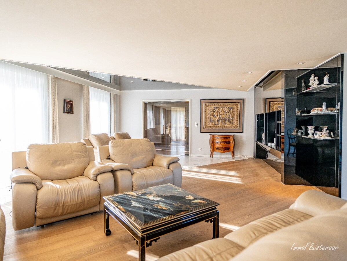 Rural villa with multifunctional outbuilding on approximately 51 acres in Bilzen 