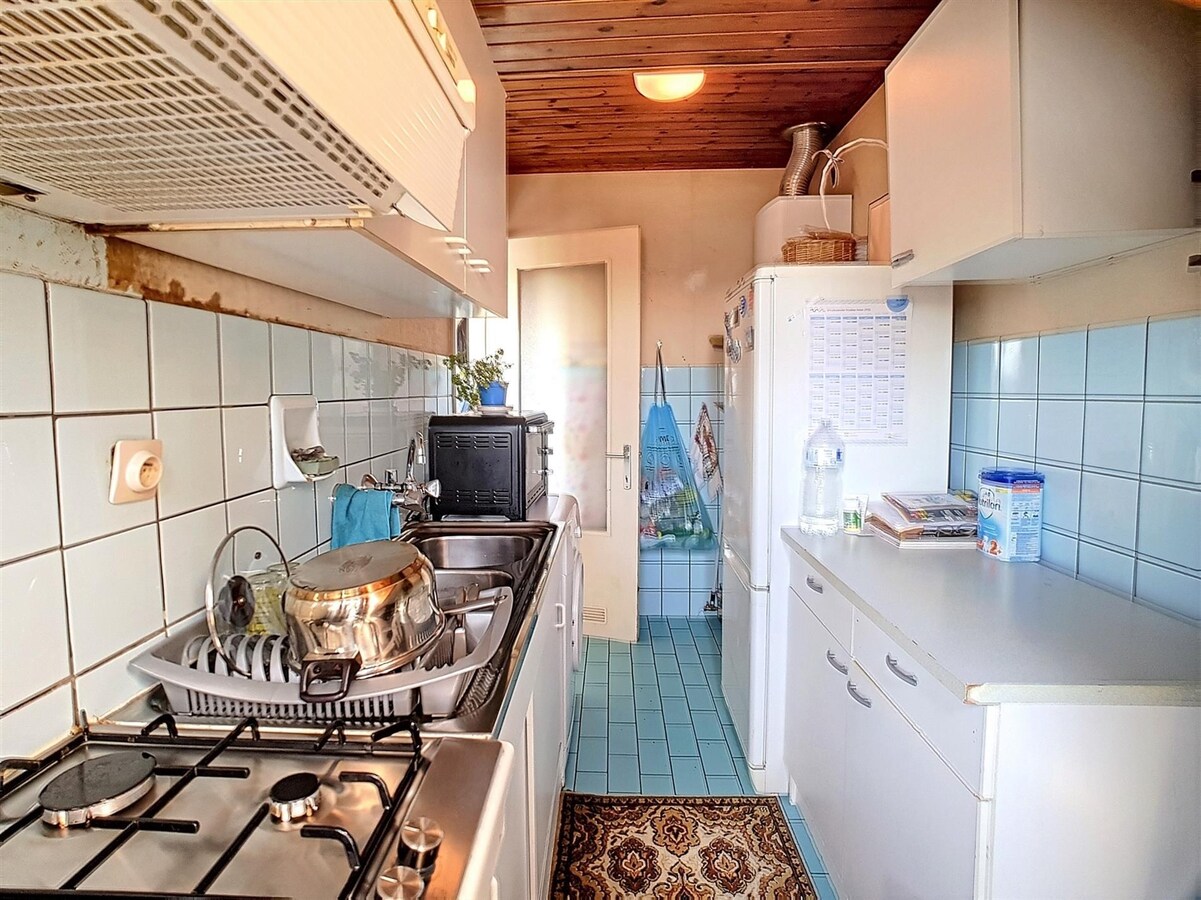 Dakppartement aan het marktplein te Heist 