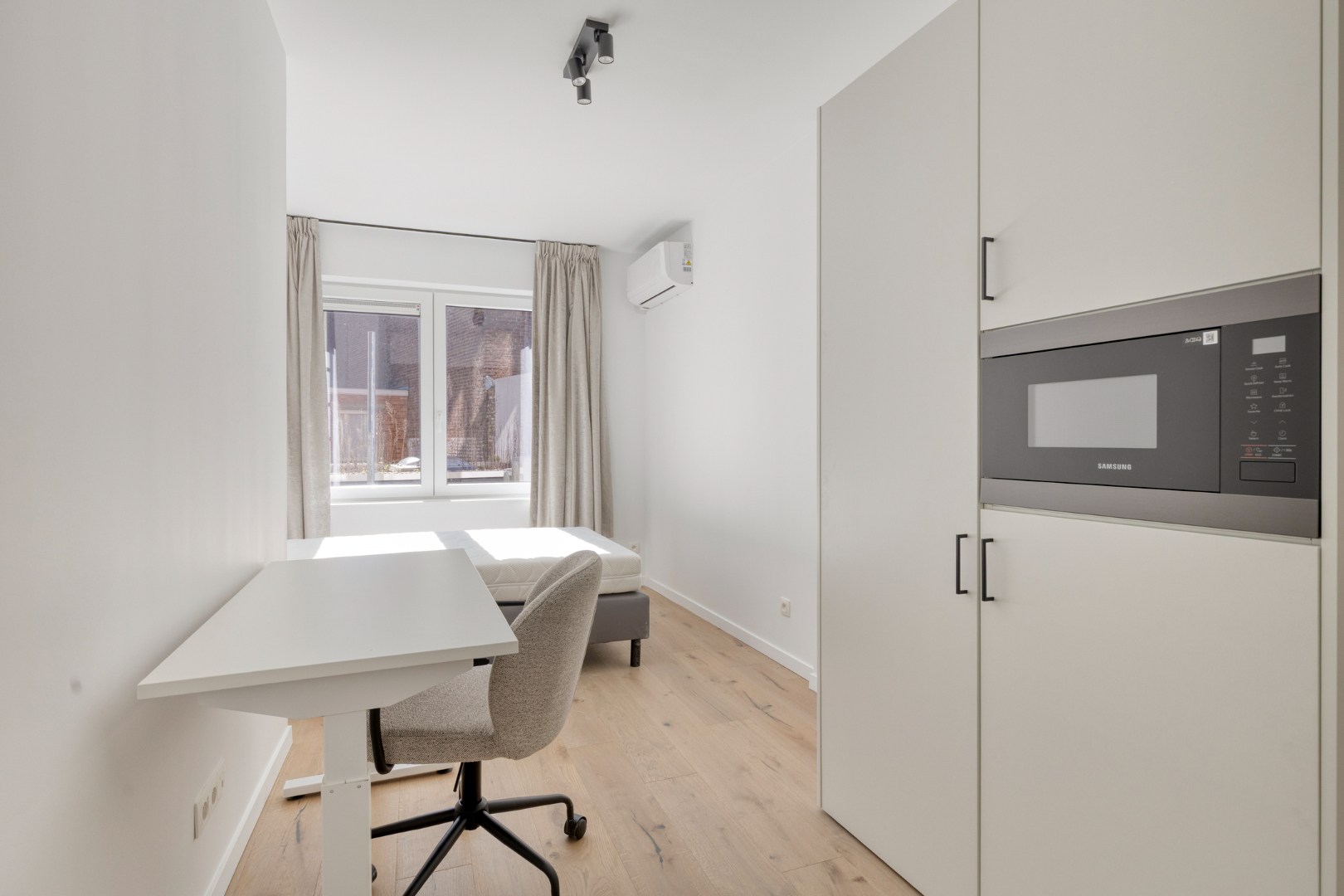 Volledig gerenoveerde studentenkamer in residentie met 15 studentenkamers en een 1slaapkamer appartement in hartje Leuven - EPC label A! 