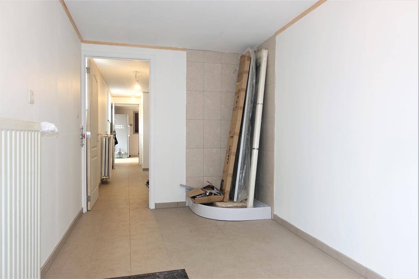 Half-open woning met grote tuin te Aartrijke 