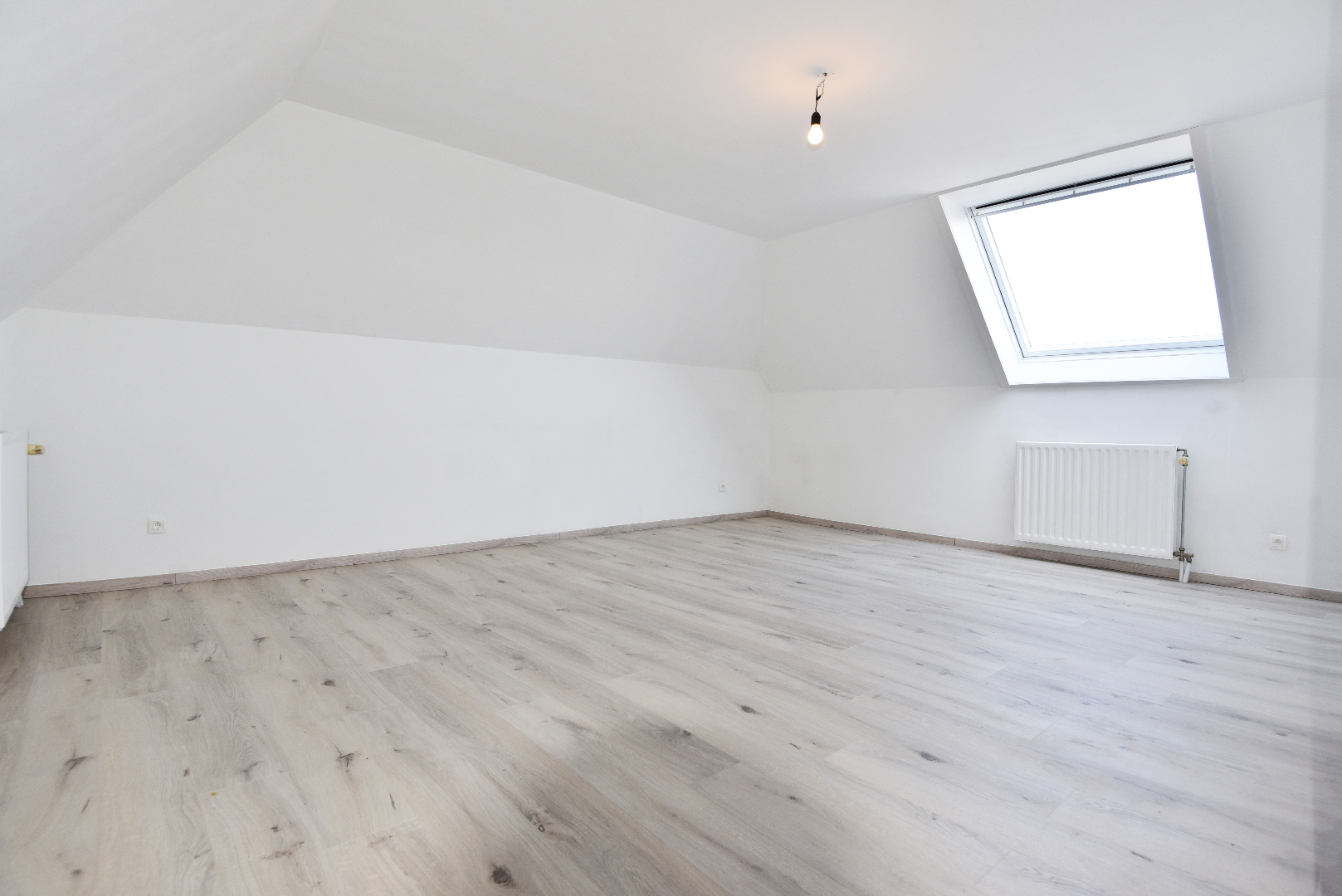 Ruim duplex app. met 3 slpks, terras &amp; garage te Adegem 