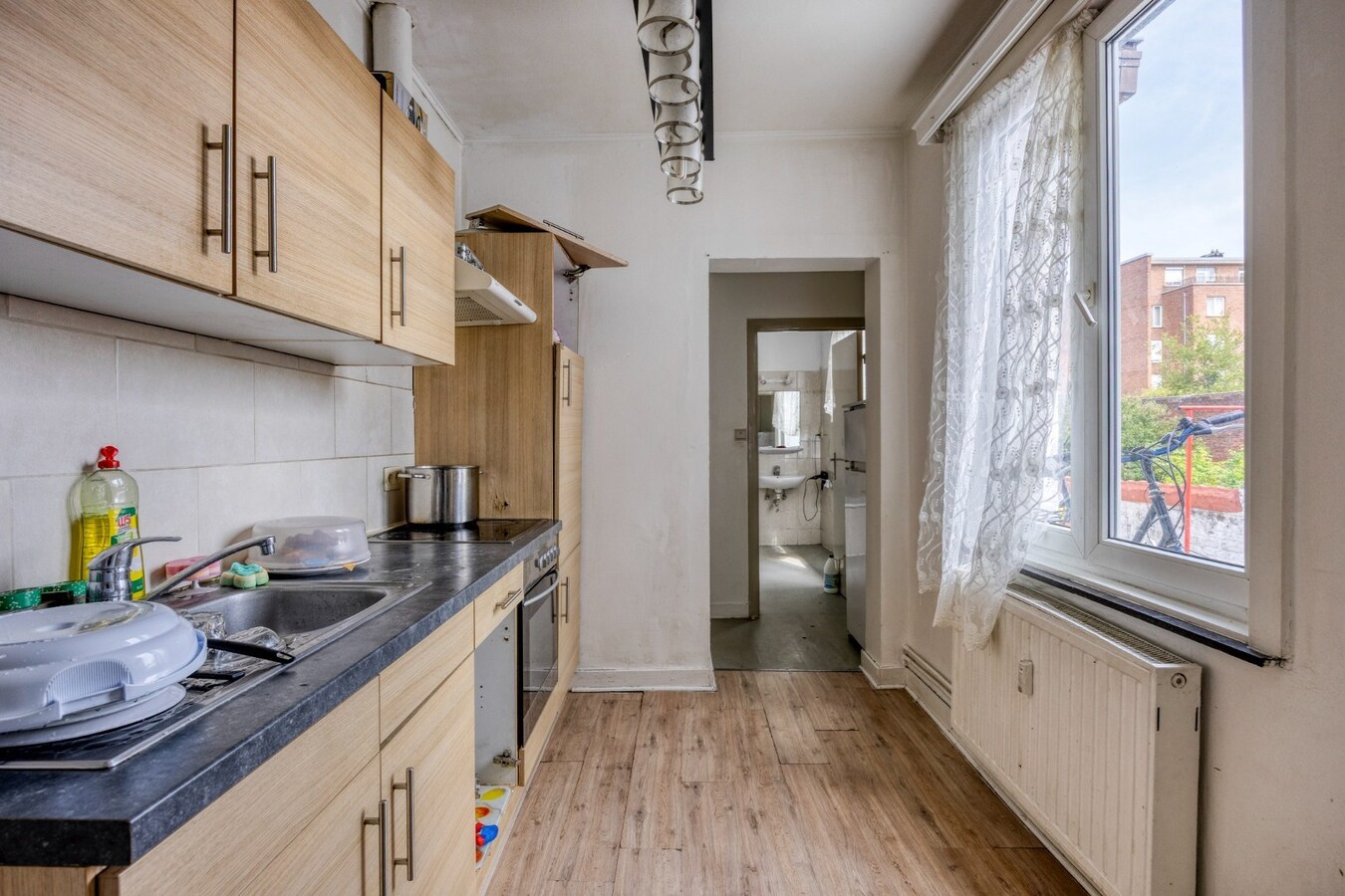 Gebouw/herenhuis bestaande uit 3 appartementen te Tienen 