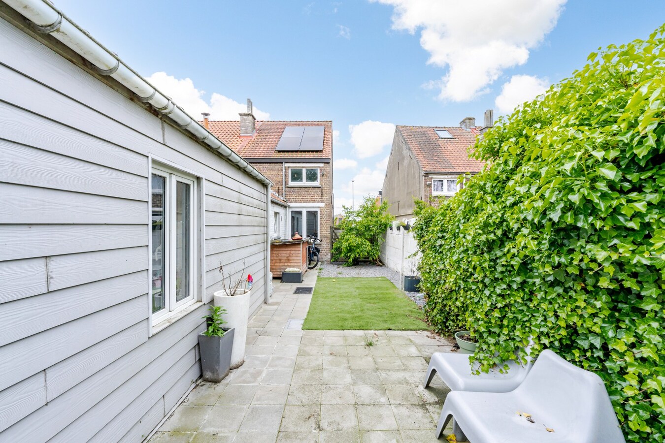 Halfopen bebouwing met potentieel nabij centrum Lovendegem 