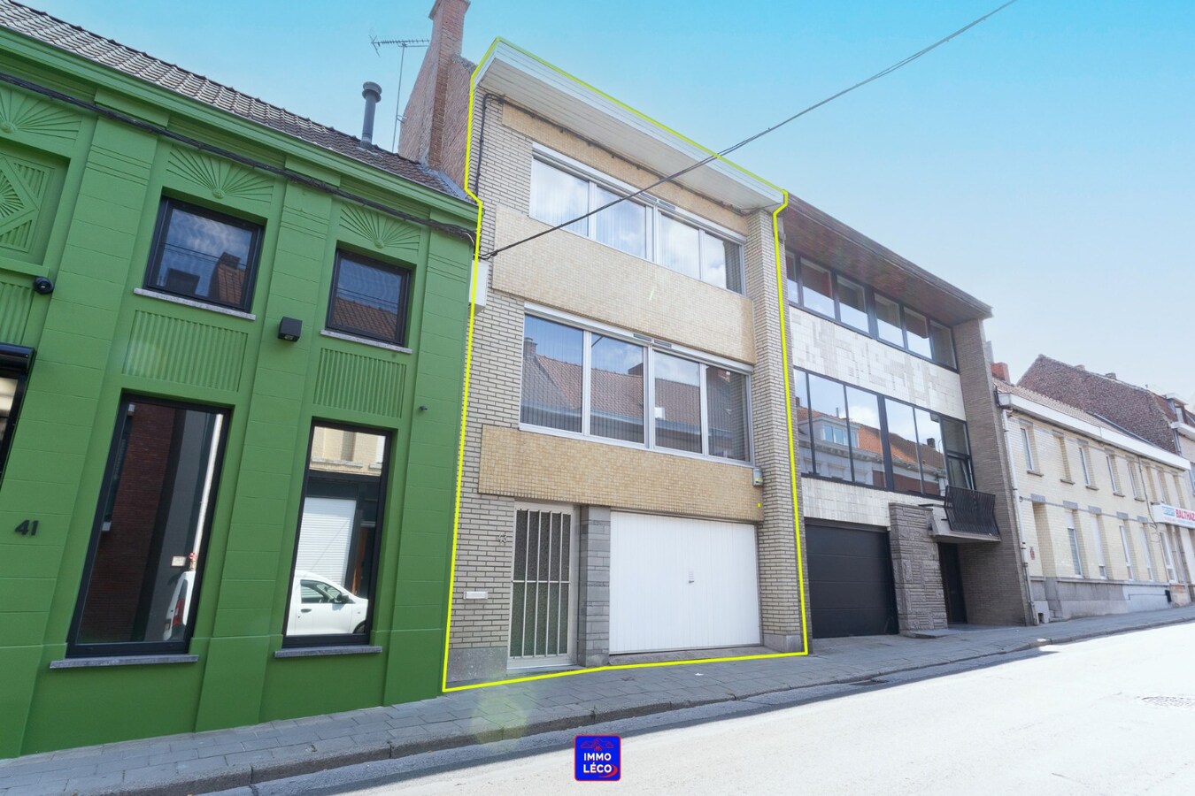 Maison "Bel-Etage" avec double garage, jardin, en plein centre-ville ! 