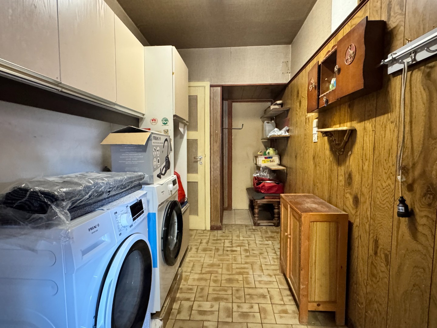 Gezellige woning met stadstuin, garage en uitweg langsachter. 