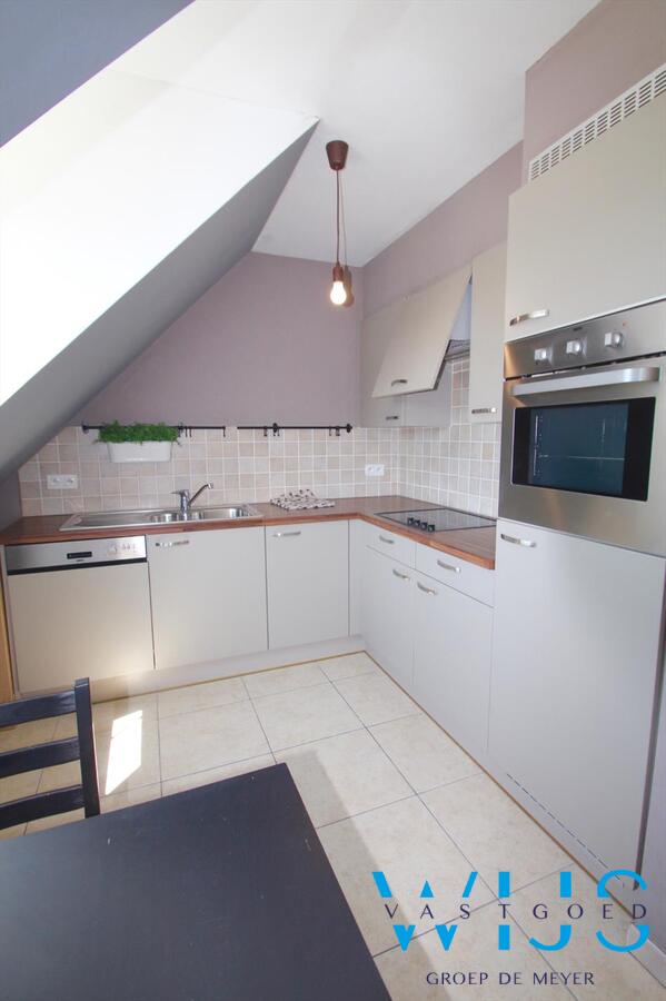 Gezellige 2 slaapkamerduplex mét garage 