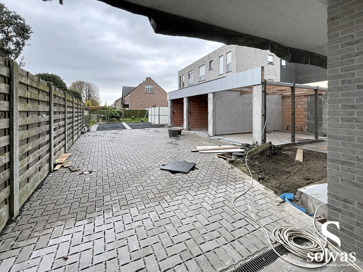 Ruim gelijkvloers nieuwbouw appartement met tuin in hartje Aalter 