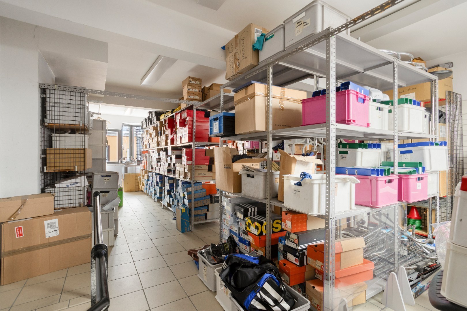 Handelspand met woonst te Halle-centrum 