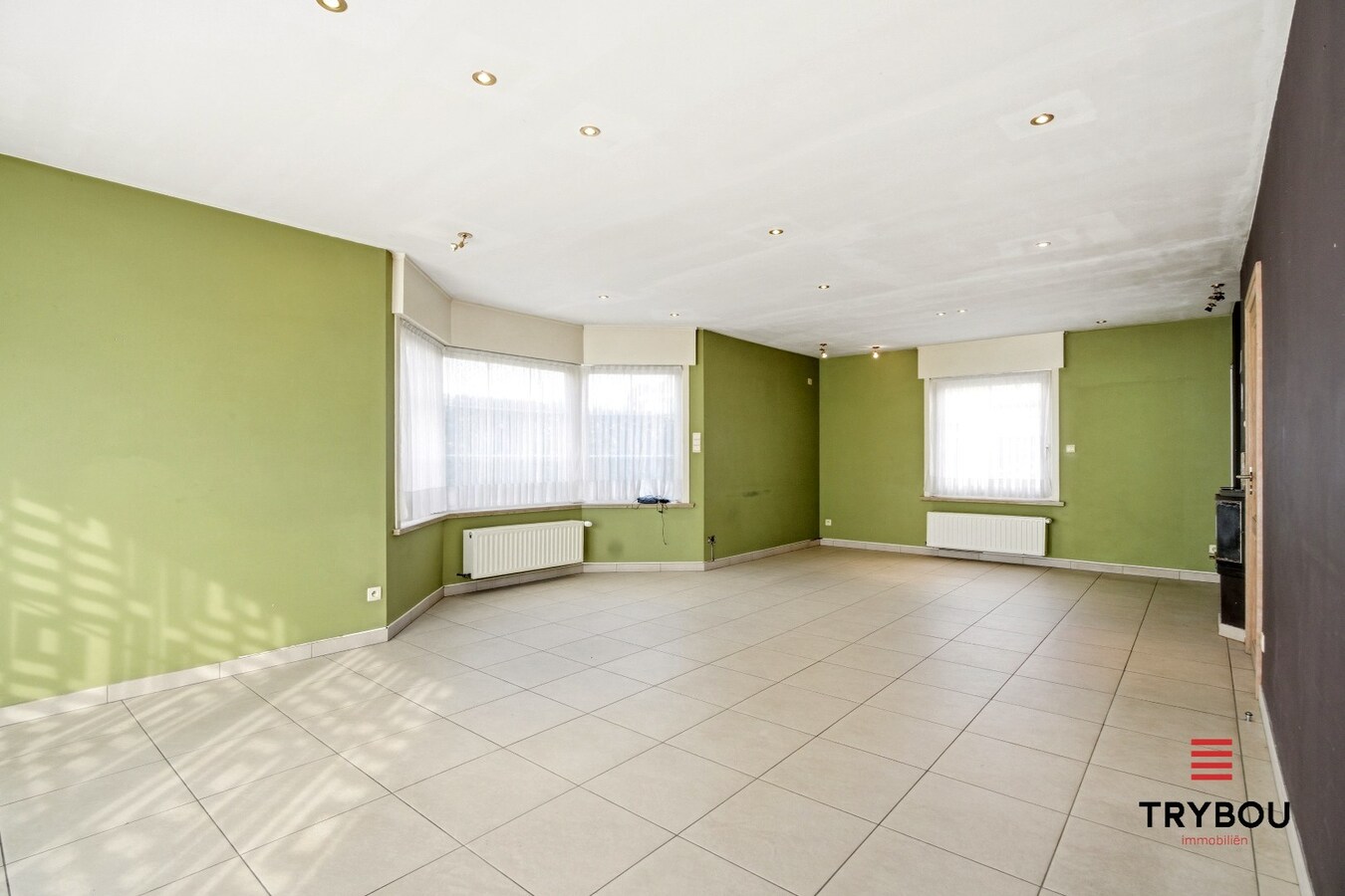 Ruime halfopen woning met 5 slaapkamers te koop in Werken met garage en ruime tuin! 
