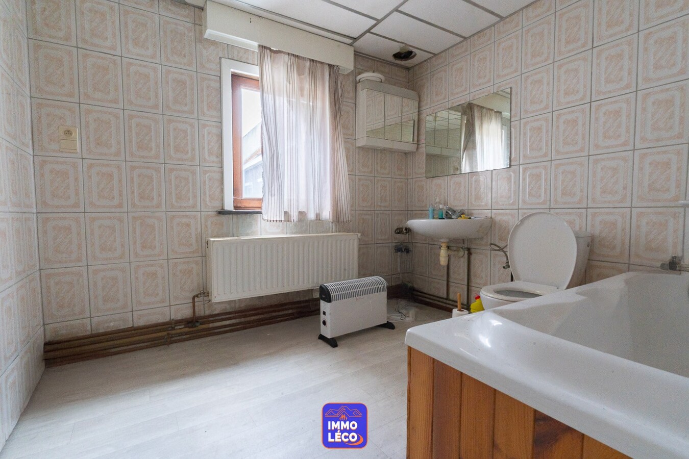 Maison de commerce avec habitation et jardin, en plein centre-ville, très beaux volumes ! 