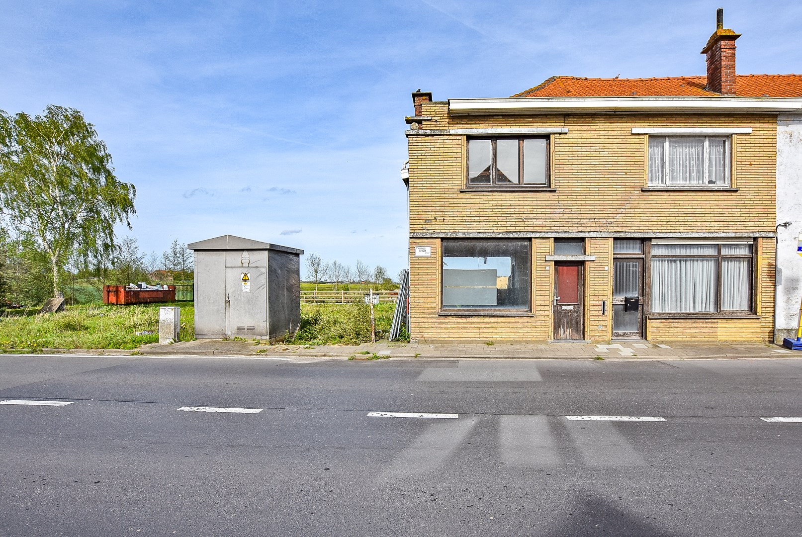 Bouwgrond met 2 renovatiewoningen te koop op 913m² 