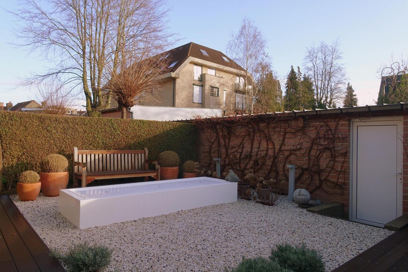 Gelijkvloers appartement met zuidgerichte tuin 