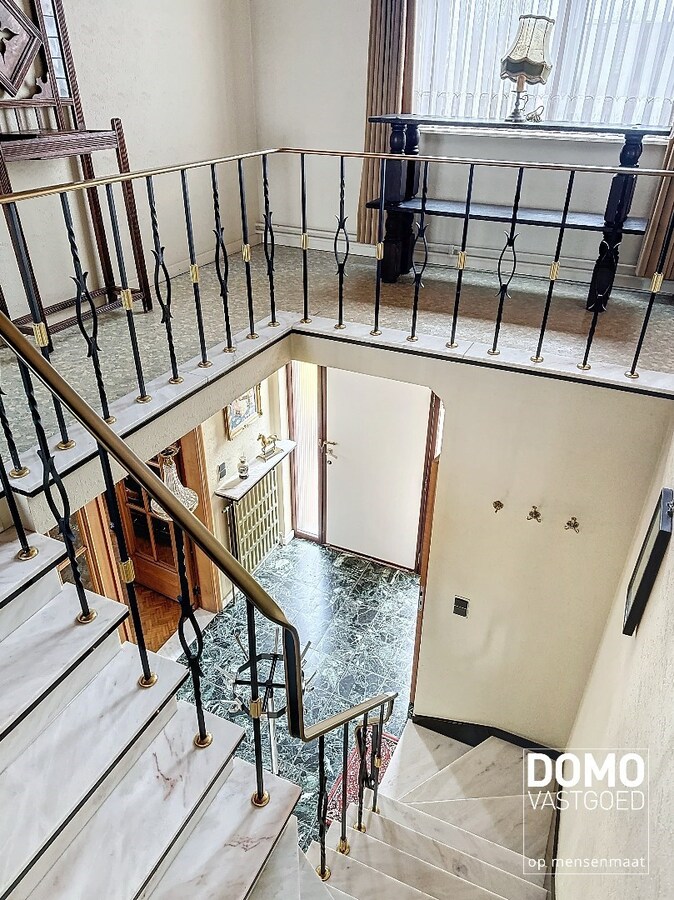 Charmante woning met ruime tuin en inpandige garage, rustig gelegen te Spalbeek. 