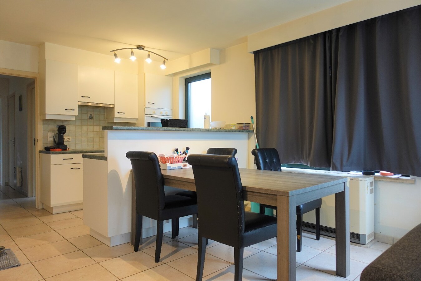 Gezellig gelijkvloersappartement met zonnige tuin en garage 