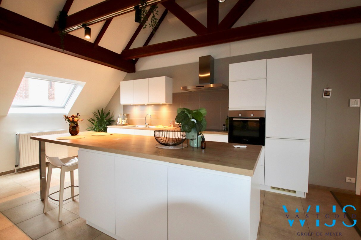 Uniek dakappartement te CENTRUM EVERGEM ! 