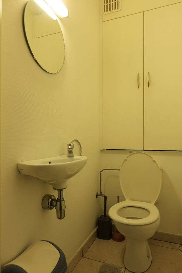 Gezellig gelijkvloersappartement met zonnige tuin en garage 