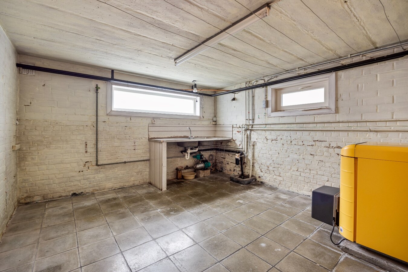 Solide en op te frissen woning te koop vlakbij centrum Lozer 